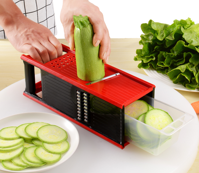 multi-functional utensil for cutting in the kitchen